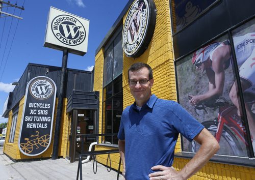 Sunday. This City. The story is on Woodcock Cycle Works and owner Tim Woodcock. Tim in front of the store.  Dave Sanderson story Wayne Glowacki / Winnipeg Free Press July 21 2015