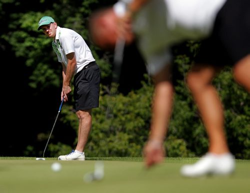 Eric Johnson at the Manitoba Amature on Bridges Golf Course Tuesday afternoon. See Story. July 21, 2015 - (Phil Hossack / Winnipeg Free Press)