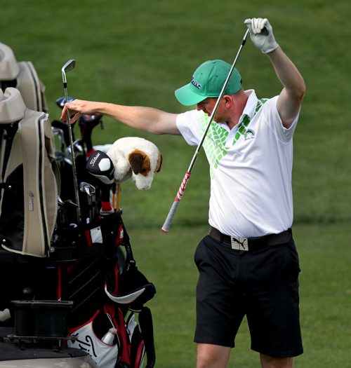 Eric Johnson works at getting just the right iron, at the Manitoba Amature on Bridges Golf Course Tuesday afternoon. See Story. July 21, 2015 - (Phil Hossack / Winnipeg Free Press)