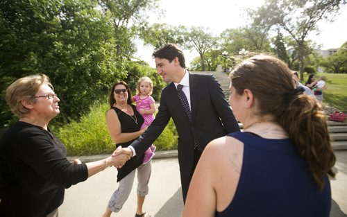 Liberal leader Justin Trudeau shakes hands with supporters after speaking at the Taché Promenade in Winnipeg on Thursday, July 23, 2015.  Mikaela MacKenzie / Winnipeg Free Press
