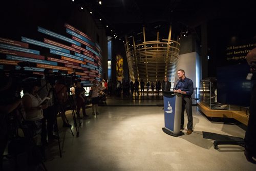 Mark Tewksbury, openly gay Olympic gold medalist, lends his medal to the Canadian Museum of Human Rights in Winnipeg on Thursday, July 23, 2015.  Mikaela MacKenzie / Winnipeg Free Press