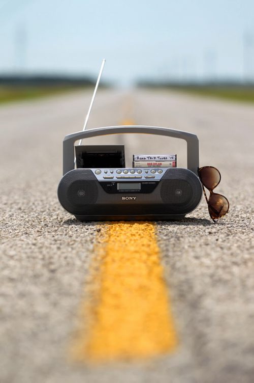 49.8 Feature on Road Trip Tunes Photo illustration of ghetto blaster, tape player, on yellow line in middle of Highway to illustrate what to listen to on long road trip. Photo taken on Hwy 322, near Teulon Manitoba.     July 23,, 2015 Ruth Bonneville / Winnipeg Free Press