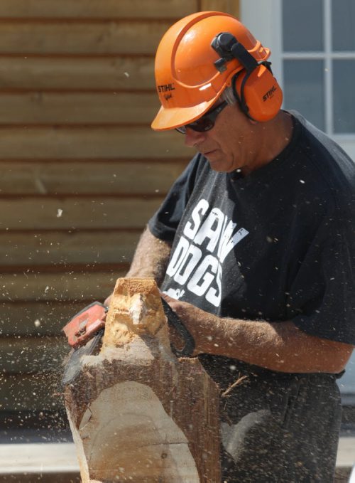 Russ Kubara displays his techniques on how to carve wood with a chainsaw at Tyndall Firewood Supply Ltd near Tyndall, Manitoba  - He teaches workshops in spring and fall-See David Sanderson story- July 23, 2015   (JOE BRYKSA / WINNIPEG FREE PRESS)