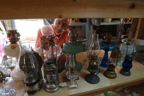 Dugald, Manitoba- Bud McIvor of Ol Lampliter Antique shop specializes in old lamps  Saloon Lamp July 01, 1880- He supplies the lanterns around the world, and to cottagers, and TV and movie productions.-See Bill Redekop story- July 23, 2015   (JOE BRYKSA / WINNIPEG FREE PRESS)