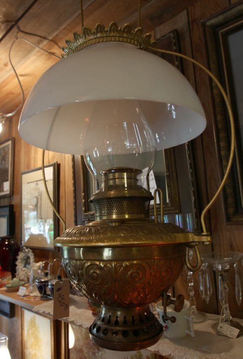 Dugald, Manitoba- Bud McIvor of Ol Lampliter Antique shop specializes in old lamps  Saloon Lamp July 01, 1880- He supplies the lanterns around the world, and to cottagers, and TV and movie productions.-See Bill Redekop story- July 23, 2015   (JOE BRYKSA / WINNIPEG FREE PRESS)