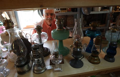 Dugald, Manitoba- Bud McIvor of Ol Lampliter Antique shop specializes in old lamps He supplies the lanterns around the world, and to cottagers, and TV and movie productions.-See Bill Redekop story- July 23, 2015   (JOE BRYKSA / WINNIPEG FREE PRESS)