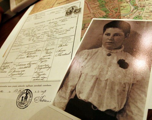 A portrait of Marni's grandmother and her birth certificate. The East European Genealogy Society is hosting a seminar on Aug. 1. Marni Domolewski, the society's president, and local expert Brian Lenius. See Alan Small's story. July 24, 2015 - (Phil Hossack / Winnipeg Free Press)