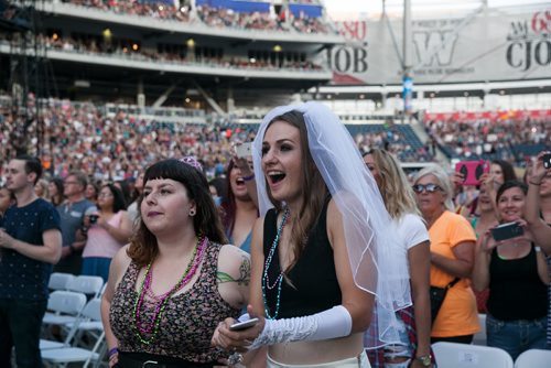 Bride-to-be Lori Darragh with friend Michelle Everton reacts as One Direction takes the stage.  One Direction performed at Investors Group Field July 24, 2015. July 24, 2015 - MELISSA TAIT / WINNIPEG FREE PRESS