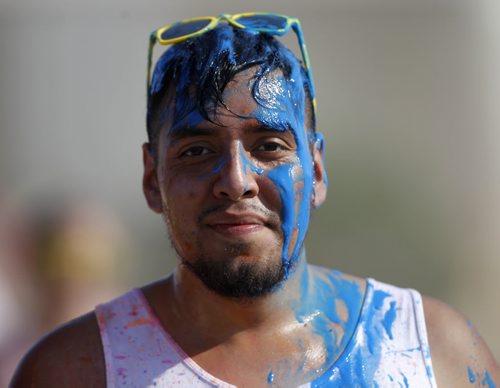 Victor Alvarenga during the Colour Me Rad 5km run at the Red River Ex grounds, Saturday, July 25, 2015. (TREVOR HAGAN/WINNIPEG FREE PRESS)