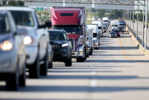 Traffic on the Perimeter trying to get to the Colour Me Rad 5km run at the Red River Ex grounds, Saturday, July 25, 2015. (TREVOR HAGAN/WINNIPEG FREE PRESS)