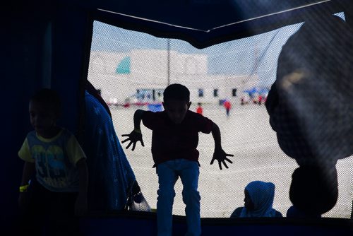 Kids play in the bouncy castle to celebrate Eid at the Grand Mosque in Winnipeg on Saturday, July 25, 2015.  Mikaela MacKenzie / Winnipeg Free Press