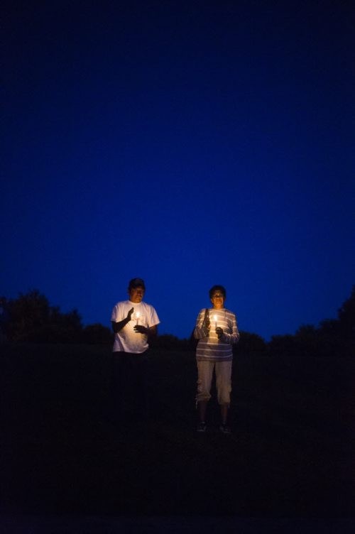 Bradley and Berle Bushie stand together at a candlelit vigil for all missing and murdered at the Forks in Winnipeg on Saturday, July 25, 2015.  Mikaela MacKenzie / Winnipeg Free Press