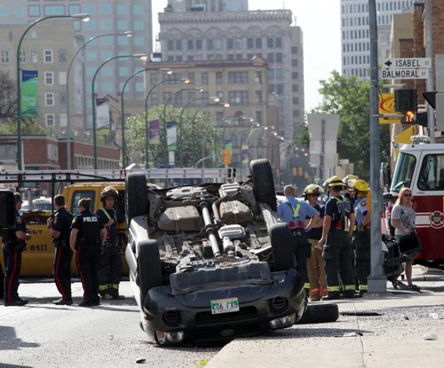 Three car mva at Notre Dame and Isabel causing morning traffic slow downs this morning  It appears injuries were minor-Breaking News- July 27, 2015   (JOE BRYKSA / WINNIPEG FREE PRESS)
