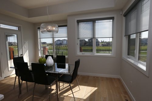 Homes. 18 Lake Bend Road in Bridgwater Lakes. Table and chairs near the kitchen in the grand room.   Contact is KDR Homes Josie Garofalo Todd Lewys story. Wayne Glowacki / Winnipeg Free Press July 27 2015