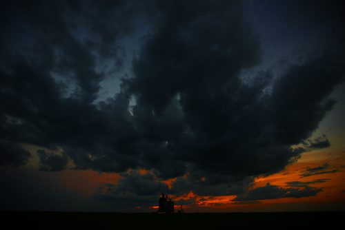 July 26, 2015 - 150726  - Storm clouds form over a grain elevator just north of Winnipeg, Monday, July 27, 2015  John Woods / Winnipeg Free Press