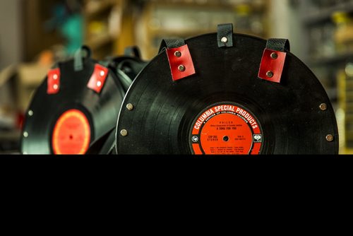 Alf Dick, volunteer at the MCC thrift store, makes purses out of old vinyl records in Winnipeg on Tuesday, July 28, 2015.  Mikaela MacKenzie / Winnipeg Free Press