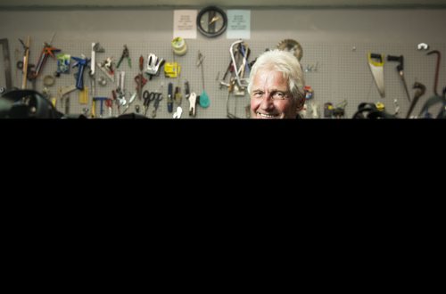 Alf Dick, volunteer at the MCC thrift store, makes purses out of old vinyl records in Winnipeg on Tuesday, July 28, 2015.  Mikaela MacKenzie / Winnipeg Free Press