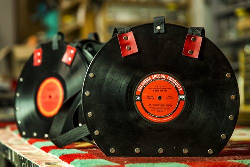 Alf Dick, volunteer at the MCC thrift store, makes purses out of old vinyl records in Winnipeg on Tuesday, July 28, 2015.  Mikaela MacKenzie / Winnipeg Free Press