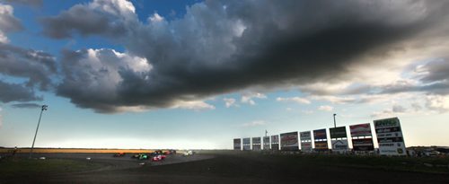 Race cars round the second turn under a summer sky at Red River Speedway's Monday night races. See  story. July 27, 2015 - (Phil Hossack / Winnipeg Free Press)