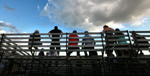 Spectators line the upper deck of the bleacher seating at Red River Speedway's Monday night races. See  story. July 27, 2015 - (Phil Hossack / Winnipeg Free Press)