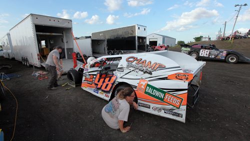 Pit crews are a family affair as racers prep thier cars at Red River Speedway's Monday night races. See  story. July 27, 2015 - (Phil Hossack / Winnipeg Free Press)