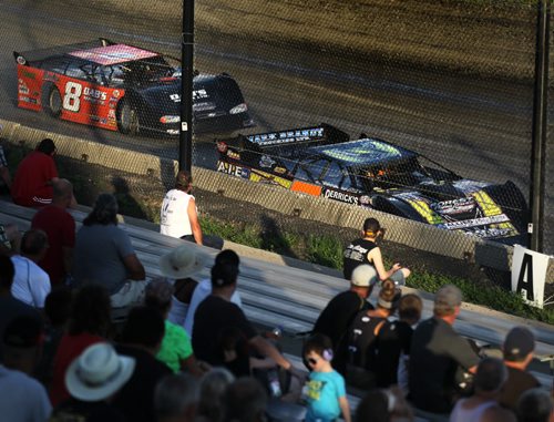 Fans sit trackside close enough to get a whiff of the action at Red River Speedway's Monday night races. See  story. July 27, 2015 - (Phil Hossack / Winnipeg Free Press)