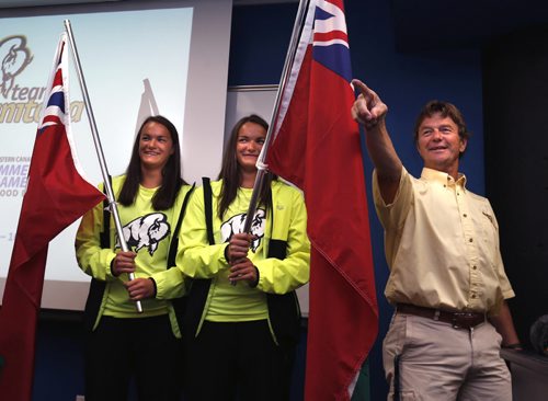 Ted Bigelow, Chef de Mission for Team Manitoba points out the proud mother of the twin sisters Josie,right, and Kearley Abbott who have been selected as Team Manitoba's flag bearers to kick off the 2015 Western Canada Summer games in Wood Buffalo, Alberta Aug, 7- August 16.  The twins are on the Beach Volleyball team and are wearing the new Team Manitoba uniform.   Scott Billeck  story Wayne Glowacki / Winnipeg Free Press July 29 2015