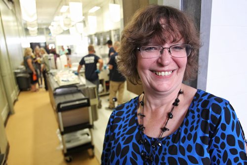 J'Lynn Johnson, Donor Relations Manager at Lighthouse Mission in the newly renovated kitchen. 150729 July 29, 2015 MIKE DEAL / WINNIPEG FREE PRESS
