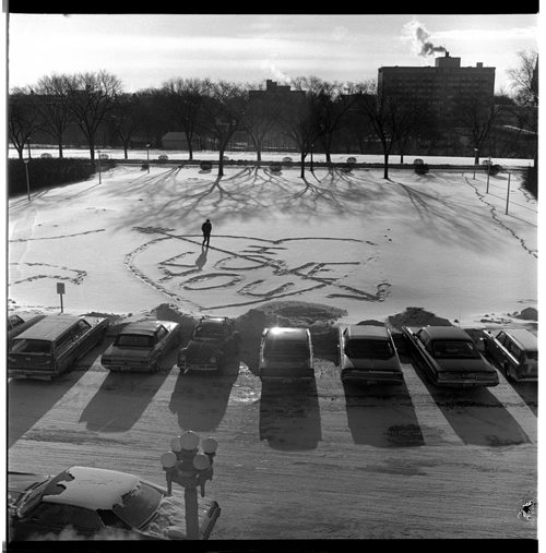 A person can be seen walking through a message of love written on the grounds of the Manitoba Legislative Building. The location is where the fountain sits now, the Assiniboine River can be seen in the background. January 12, 1970 Gerry Cairns / Winnipeg Free Press fparchives
