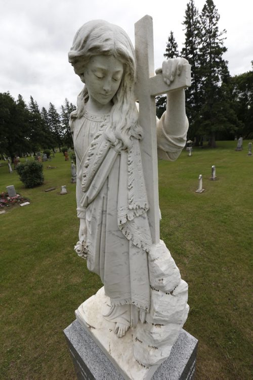Margaret Laurence's famous Stone Angel that is part of the headstone in the Riverside Cemetery in Neepawa, Mb. of the Hon.John Andrew Davidson who died in 1903 and his wife Sophia who died in 1913. Bill Redekop story. Wayne Glowacki / Winnipeg Free Press July 28 2015