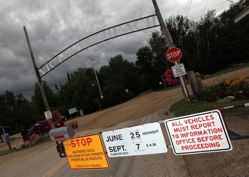 Vehicle Access to cottages and beach area is blocked during the summer months. See Carol Sanders story re: Handicap Access for Janis Ollson. July 29, 2015 - (Phil Hossack / Winnipeg Free Press)