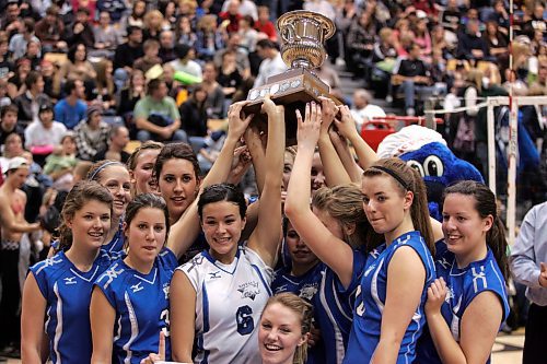 BORIS MINKEVICH / WINNIPEG FREE PRESS  071203 The Lord Selkirk Royals win the highschool volleyball championship at the Investors Group Centre.