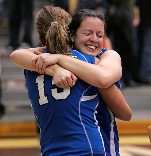 BORIS MINKEVICH / WINNIPEG FREE PRESS 071203 The Lord Selkirk Royals win the highschool volleyball championship at the Investors Group Centre.