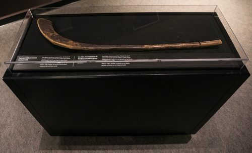 Canada's oldest known hockey stick on display at the Manitoba Museum, on loan from the Canadian Museum of History. The stick, which originates from Cape Breton in the 1830s, is shaped in the Mi'kmaq style from sugar maple wood. July 30, 2015 - MELISSA TAIT / WINNIPEG FREE PRESS