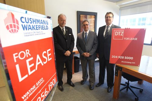 Brett Ferguson, left, Curtis Loewen, centre, Martin McGarry-who are the owners of a newly created holding company (CW Winnipeg Inc.) which earlier this week acquired the three real-estate-services related businesses of the Stevenson Group. See Murray McNeil story- July 31, 2015   (JOE BRYKSA / WINNIPEG FREE PRESS)