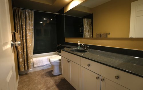 Homes. The condo at 153 - 144 Portsmouth Boulevard in the Terraces of Tuxedo. The bathroom. The realtor is Andrew Single. Todd Lewys story Wayne Glowacki / Winnipeg Free Press July 31 2015