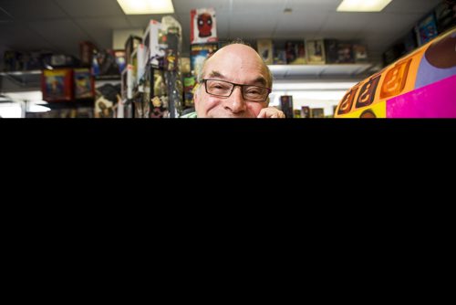 Joe Krolik, owner of Comics America, poses in his store filled with comics and pop culture stuff dating back to the early 1900s in Winnipeg on Saturday, Aug. 1, 2015.  Mikaela MacKenzie / Winnipeg Free Press