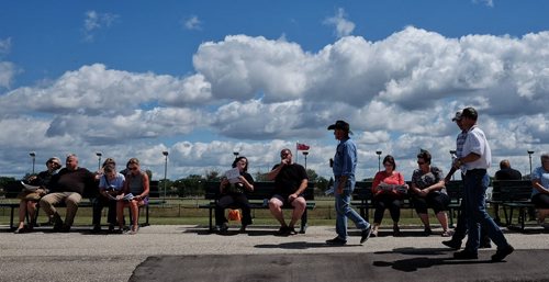 Crowd gather before the first race of the day at Assiniboina Downs during Manitoba Derby day.  150803 August 03, 2015 MIKE DEAL / WINNIPEG FREE PRESS