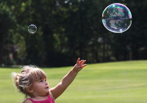 Chasing Bubbles-  2 year old Bailey Katchen chases bubbles Tuesday afternoon at Kildonan Park Standup Photo- Aug 04, 2015   (JOE BRYKSA / WINNIPEG FREE PRESS)
