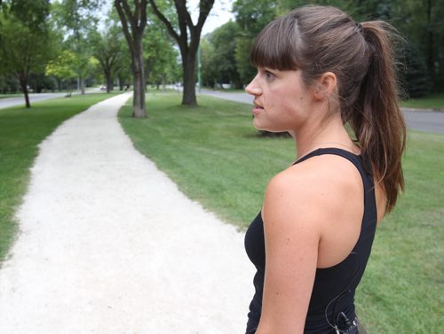 33 yr old Amory Steek tells her tale of two bizarre incidents this week where a man drops his wallet on Wellington Cres. She tells tale on the spot on Wellington where incidents occurred-See  Katie May  story- Aug 05, 2015   (JOE BRYKSA / WINNIPEG FREE PRESS)