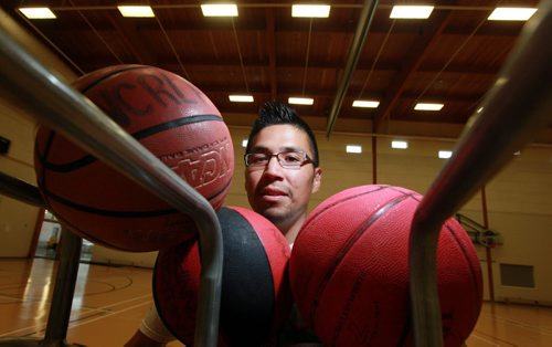 Carter Goosehead poses Thursday. He's the organizer of the Dufferin Youth basketball initiative and is helping organize a group of Dufferin neighbourhood youth who have organized several tournaments this summer. This photo is for Melissas sports Saturday Special. August 6, 2015 - (Phil Hossack / Winnipeg Free Press)