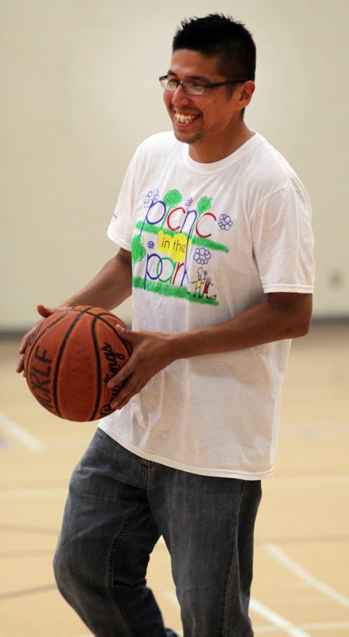 Carter Goosehead, he's the organizer of the Dufferin Youth basketball initiative and is helping organize a group of Dufferin neighbourhood youth who have organized several tournaments this summer. This photo is for Melissas sports Saturday Special. August 6, 2015 - (Phil Hossack / Winnipeg Free Press)
