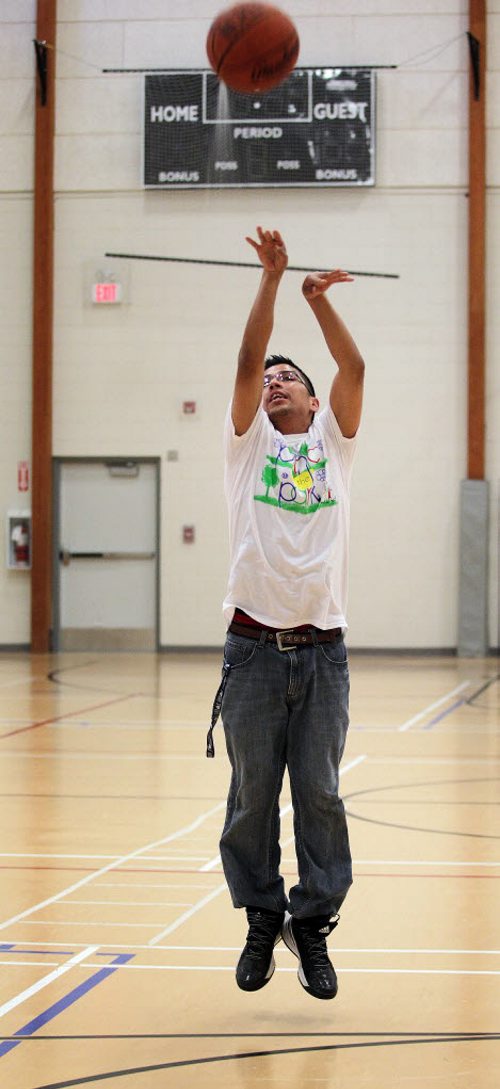 Carter Goosehead takes a jump shot, he's the organizer of the Dufferin Youth basketball initiative and is helping organize a group of Dufferin neighbourhood youth who have organized several tournaments this summer. This photo is for Melissas sports Saturday Special. August 6, 2015 - (Phil Hossack / Winnipeg Free Press)