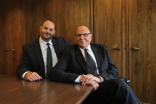 Saturday special, profiling the unique number of father-son lawyer combos now in city. Weinstein (Hymie and his son Josh), Portrait  taken in their office on Graham Ave.  for piece  running Saturday.  See Mike McIntyre story.  Aug 6, 2015 Ruth Bonneville / Winnipeg Free Press