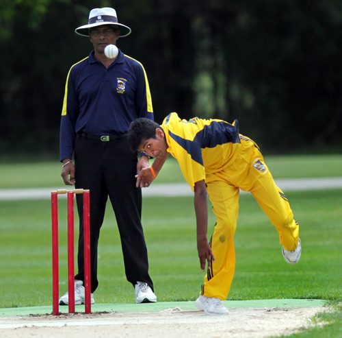 Manitoba's Part Patel , a left arm bowler hurls the ball at the wicket  Friday afternoon in the final day of the Cricket Canada U-16 Championships.  See Tim Campbell's story. August 7, 2015 - (Phil Hossack / Winnipeg Free Press)