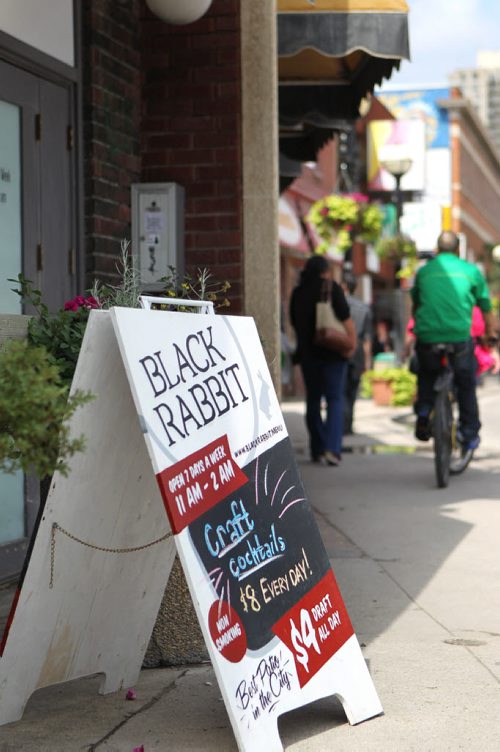 Black Rabbit Bistro, outdoor sign at  135 Osborne St.    See Dave Sanderson story on travelling sign painters.  Aug 6, 2015 Ruth Bonneville / Winnipeg Free Press