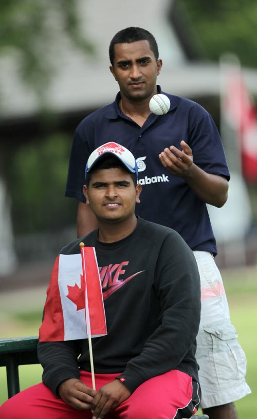 Manitoba members of Team Canada Abdul Haseeb (standing) and Sarbjot Singh pose Friday afternoon in the final day of the Cricket Canada U-16 Championships.  See Tim Campbell's story. August 7, 2015 - (Phil Hossack / Winnipeg Free Press)