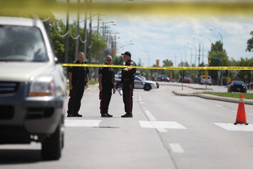 Police Officers investigate a pedestrian  accident involving an older woman crossing at a cross walk on St. Annes Rd. at Compark Saturday afternoon.  No other information available at this time.   Aug 8, 2015 Ruth Bonneville / Winnipeg Free Press