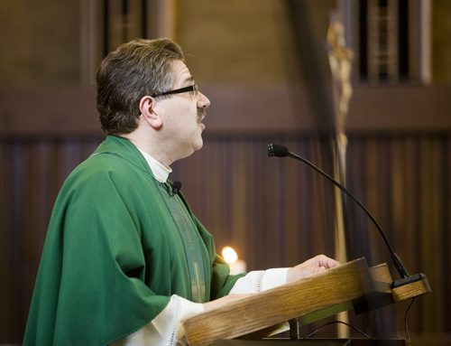 Reverend Rob Polz leads mass at St. John XXIII Church in Winnipeg on Saturday, Aug. 8, 2015.  Many faith groups are urging parishioners to vote and issuing election guides on issues. Mikaela MacKenzie / Winnipeg Free Press