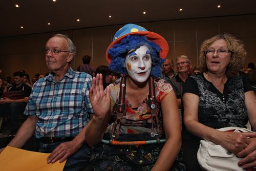 Tracy Feschuk as Zilly the Clown sits in one of the two waiting rooms inside the conference level for the casting call at Fairmont Sunday for a movie starring Dennis Quaid, Peggy Lipton and Britt Robertson. 150809 August 09, 2015 MIKE DEAL / WINNIPEG FREE PRESS